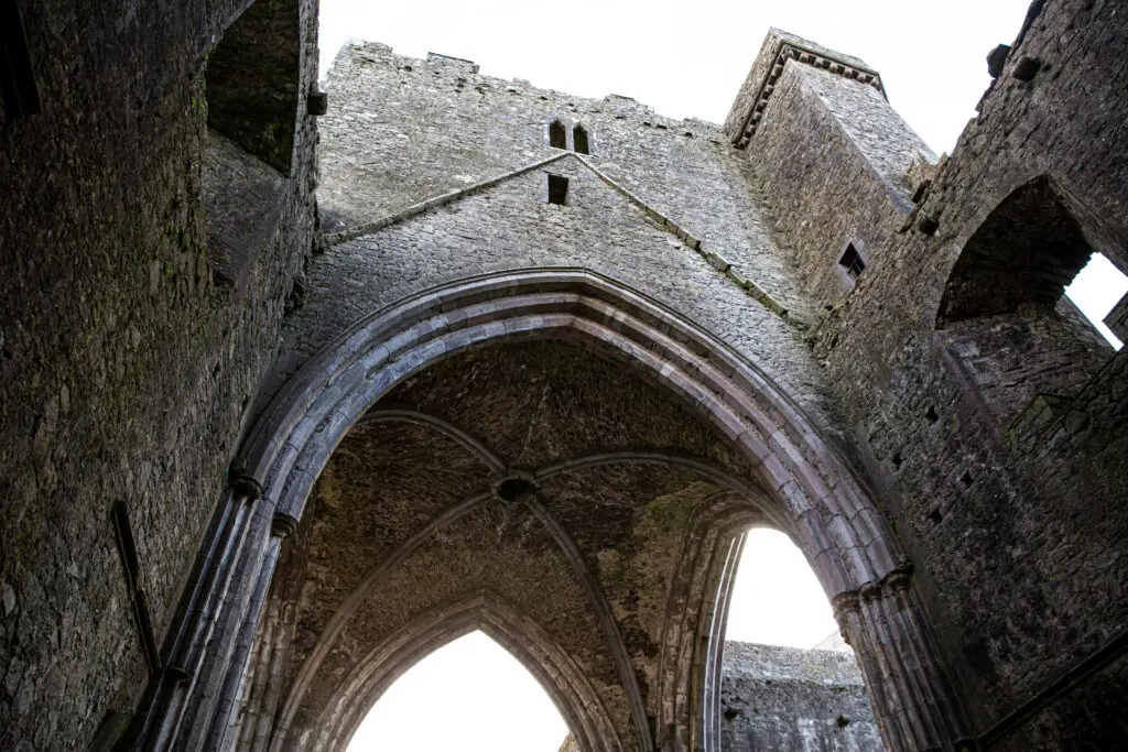 Stone archways and medieval architecture inside the historic Rock of Cashel, County Tipperary, Ireland