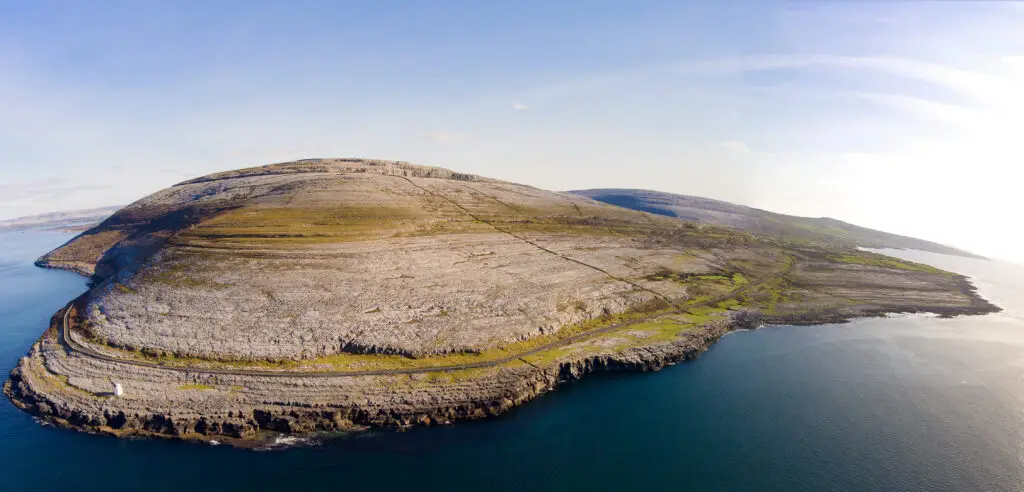 Aerial view of The Burren National Park in County Clare, Ireland, showcasing its unique limestone landscape, coastal cliffs, and scenic Atlantic shoreline.