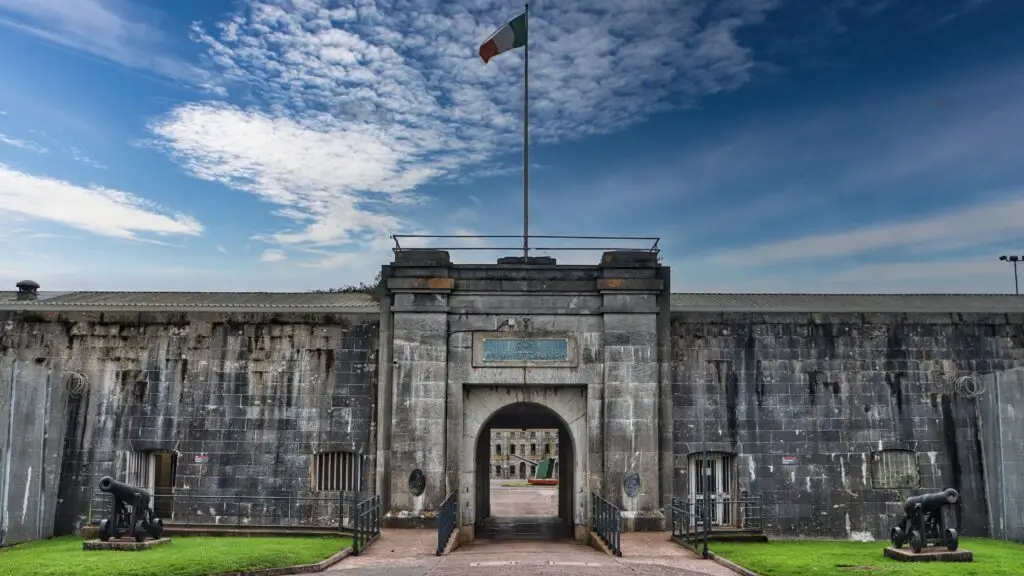 Historic entrance to Spike Island fortress with Irish flag and cannons, Cobh, County Cork, Ireland tourist attraction